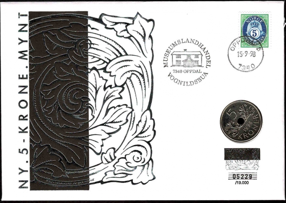 Mynt: Ny 5 krone 1998, med motiv inspirert av treskjærerkunst fra Oppdal.
Frimerke: Posthornmerke med samme valør som myntens pålydende.
Stempel: Oppdal, 15.09.1998.
Opplag: 19.000 Stk. // Bakark medfølger.
